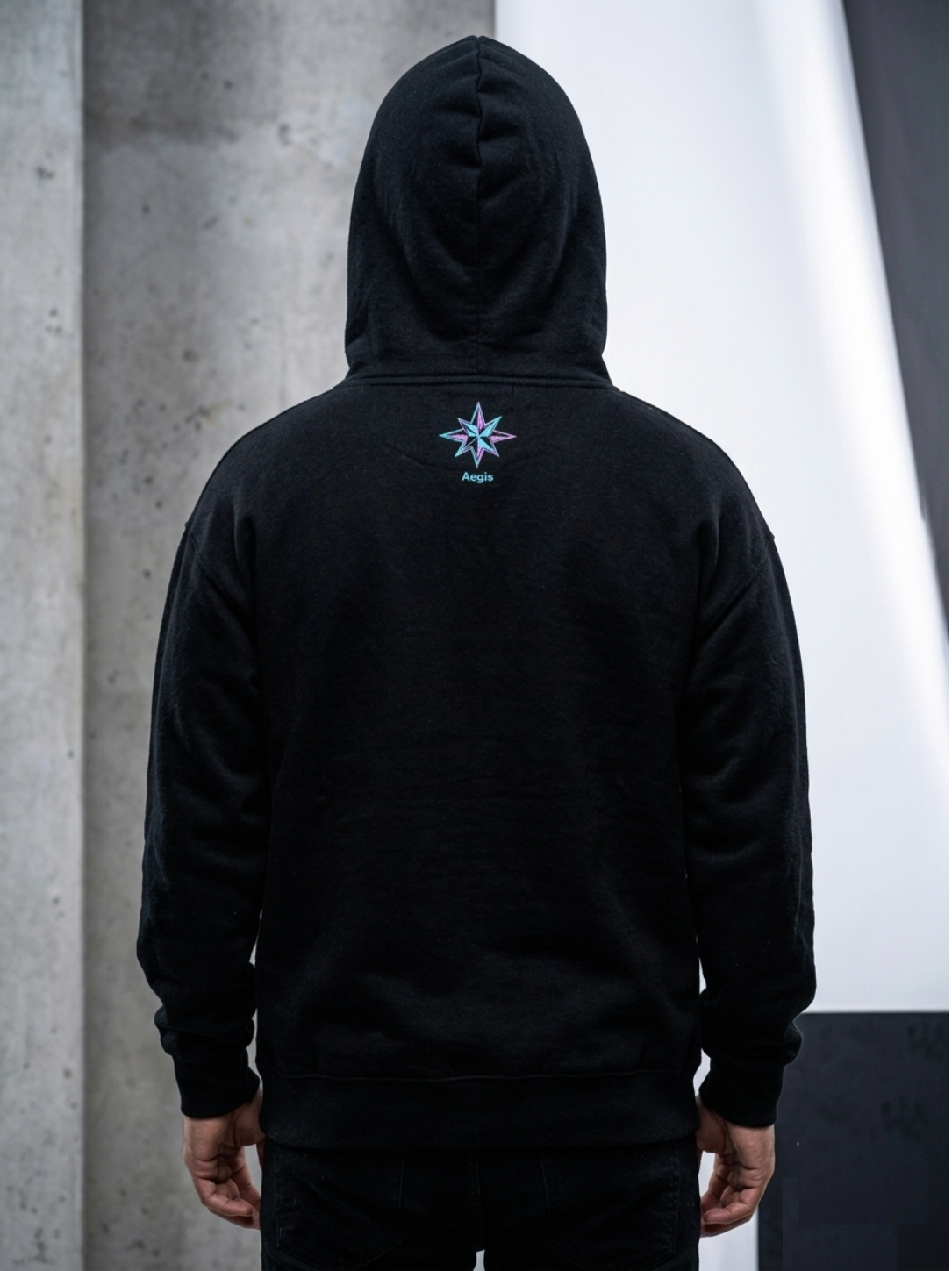 AEGIS Graphic Hoodie - Black Streetwear Pullover w/ Teal & Purple Star Emblem - Image 2